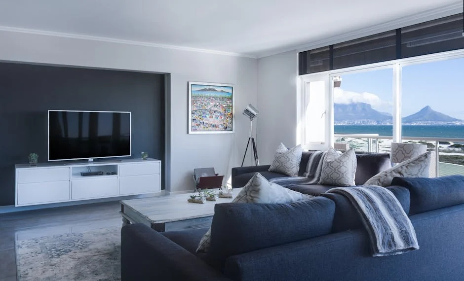Stylish living room with a view of Table Mountain, blending modern design with natural beauty